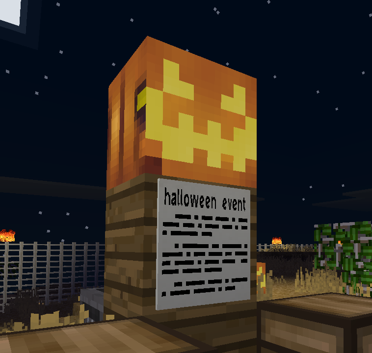 Screenshot von einer Szene in Minetest. Es ist Nacht, zwei Kisten stehen vor einem selbstgebautem Monster, welches aus zwei Holzblöcken und einer Laterne mit gruseligem Gesicht, besteht. Auf dem mittleren Block steht Halloween Event und kleinerer weiterer Text geschrieben, welcher nicht lesbar ist. Im Hintergrund sind weitere Laternen und ein Zaun. Wir befinden uns in einer Wüstenlandschaft.